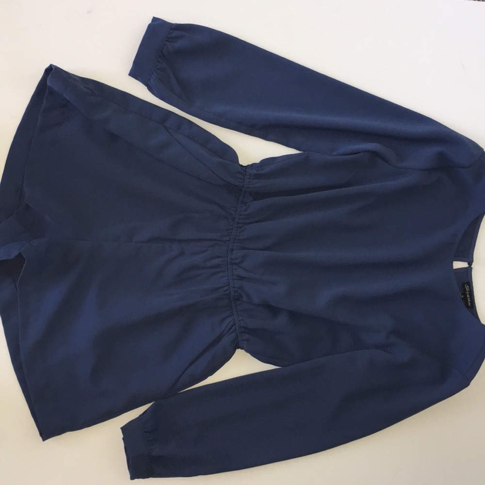 Woman’s blue romper